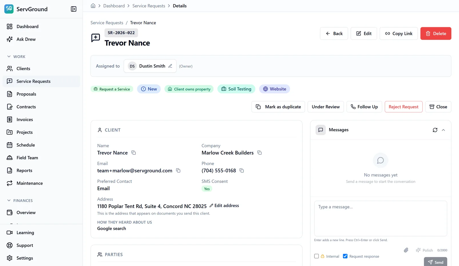 A service request in ServGround showing the client, company, contact details, and message thread